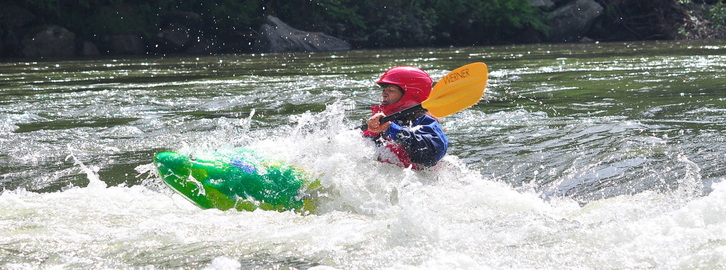 whitewater kayaking on the class II rapids of the middle Youghiogheny River in Pennsylvania's Allegheny Mountains near Ohiopyle, PA.
